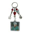 Clear acrylic saiki k beaded anime keychain with white hair character square portrait and dangling charms including stars and berries