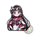 A glossy enamel pin featuring a chibi-style Sailor Moon with black hair purple eyes and red bow in sailor uniform