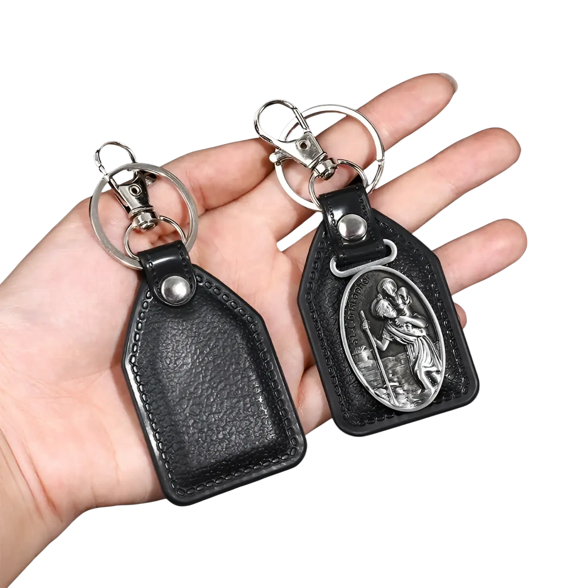 Saint Christopher leather keychain in black with silver-toned clasp and oval bronze medallion depicting saint christopher