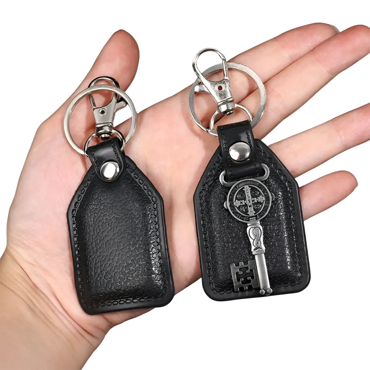 Black leather Saint Christopher keychain with silver-toned clasp and decorative antique bronze key pendant