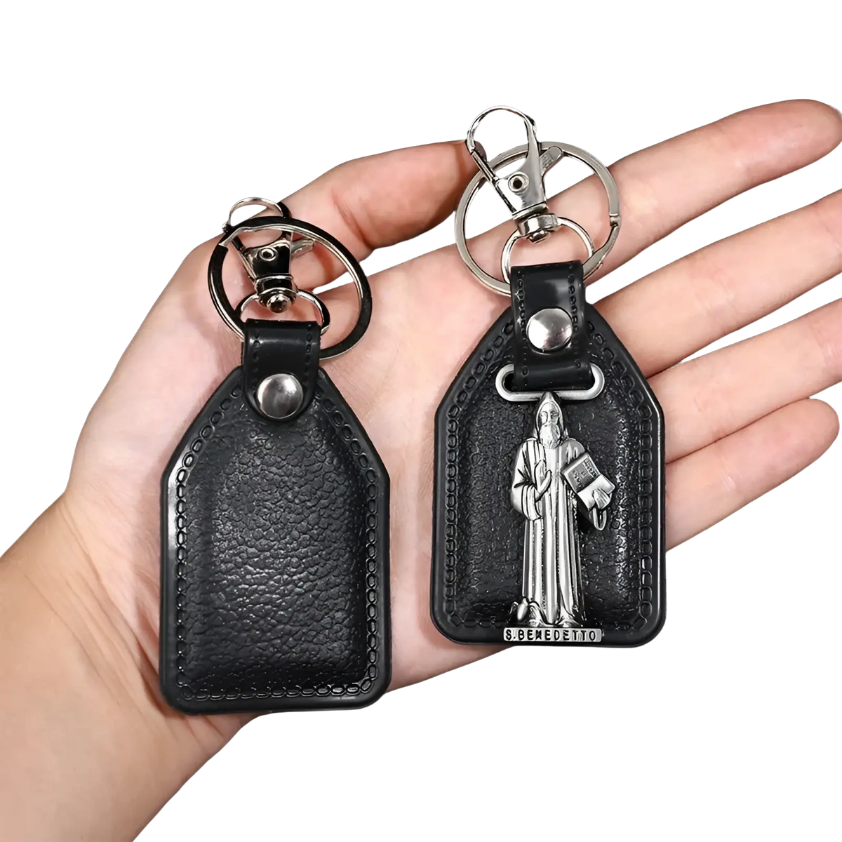 Black leather saint christopher keychain with silver metal saint figure and engraved nameplate in antique bronze finish