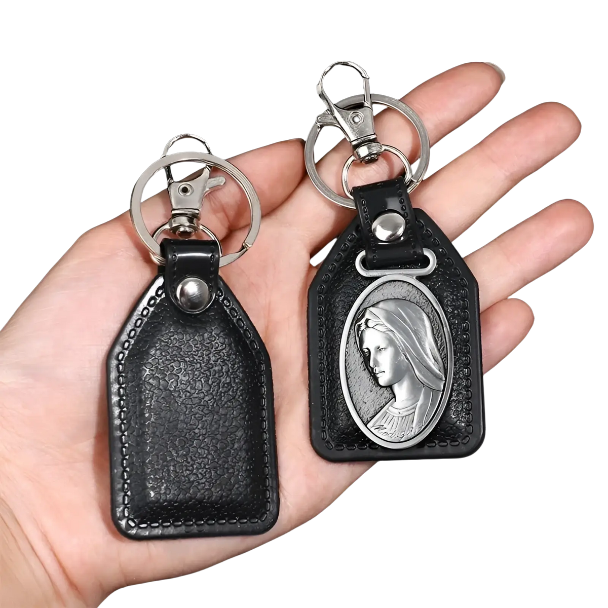 Black leather saint christopher keychain with silver-toned clasp and oval religious medallion in antique bronze finish