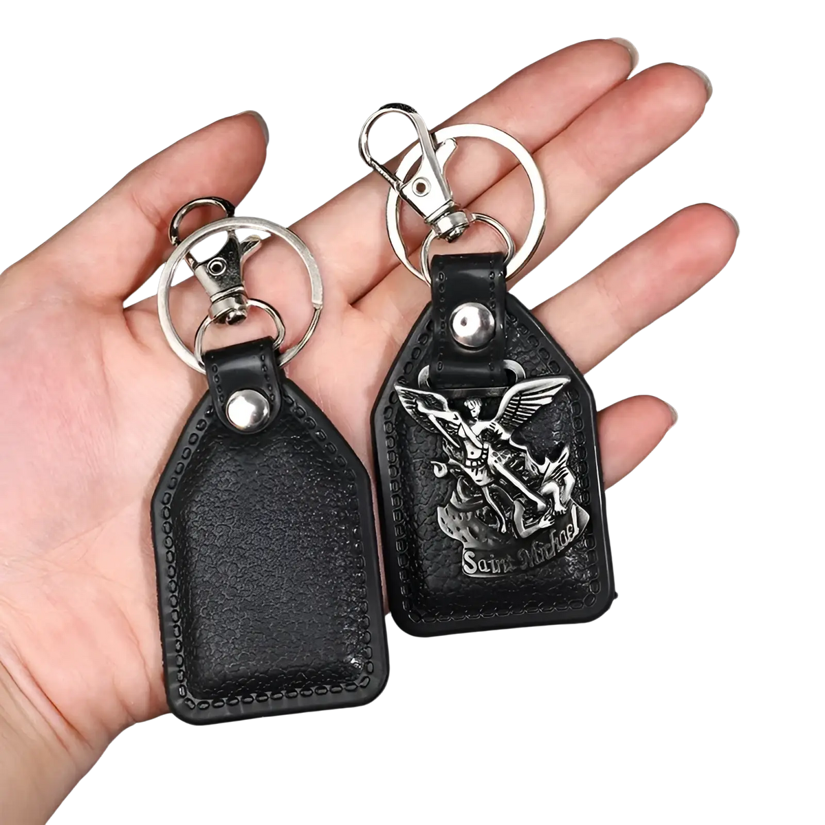 Black leather saint christopher keychain with silver-toned saint michael emblem and snap hook antique bronze finish