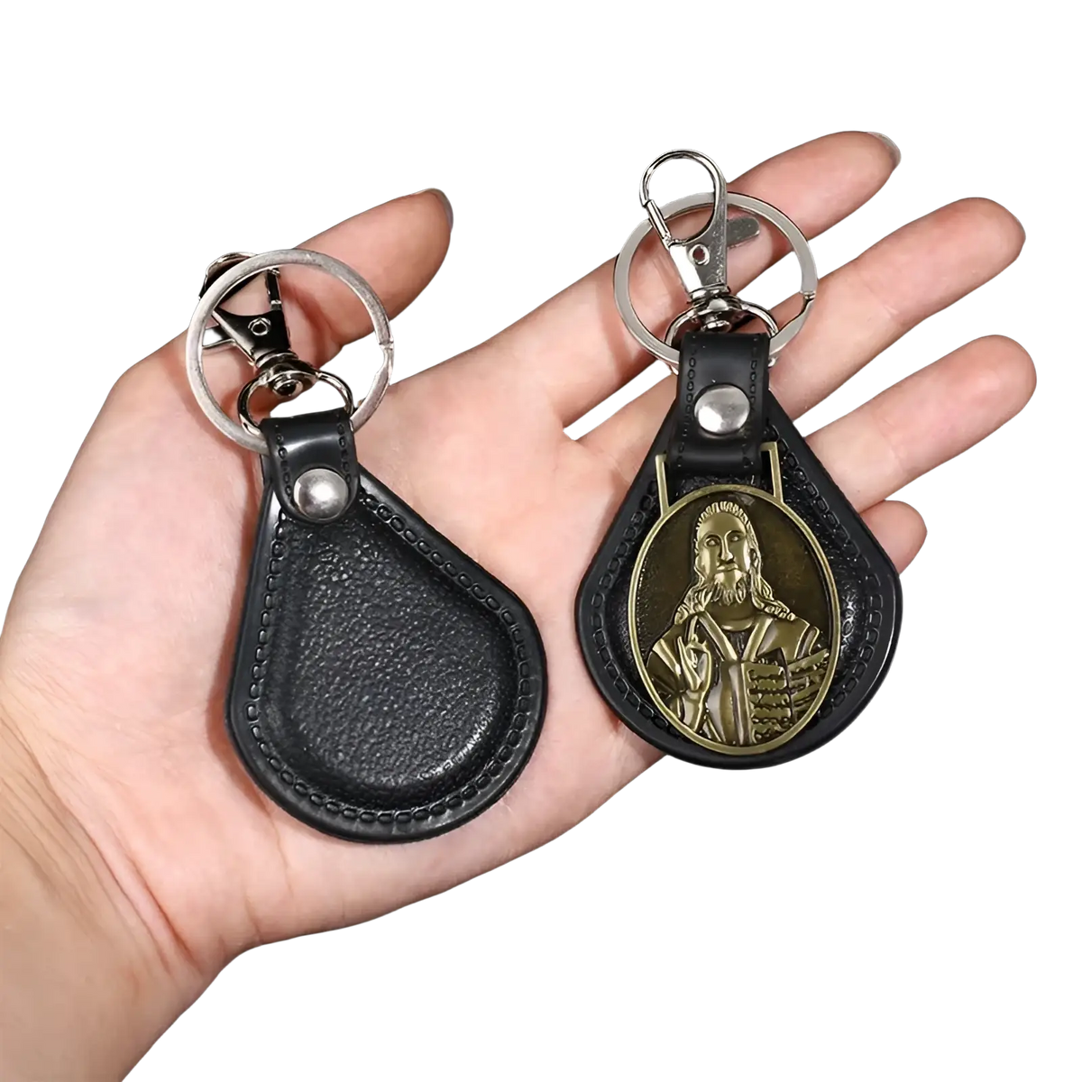 Black leather Saint Christopher keychain with silver metal clasp and gold-tone religious oval medallion antique bronze finish