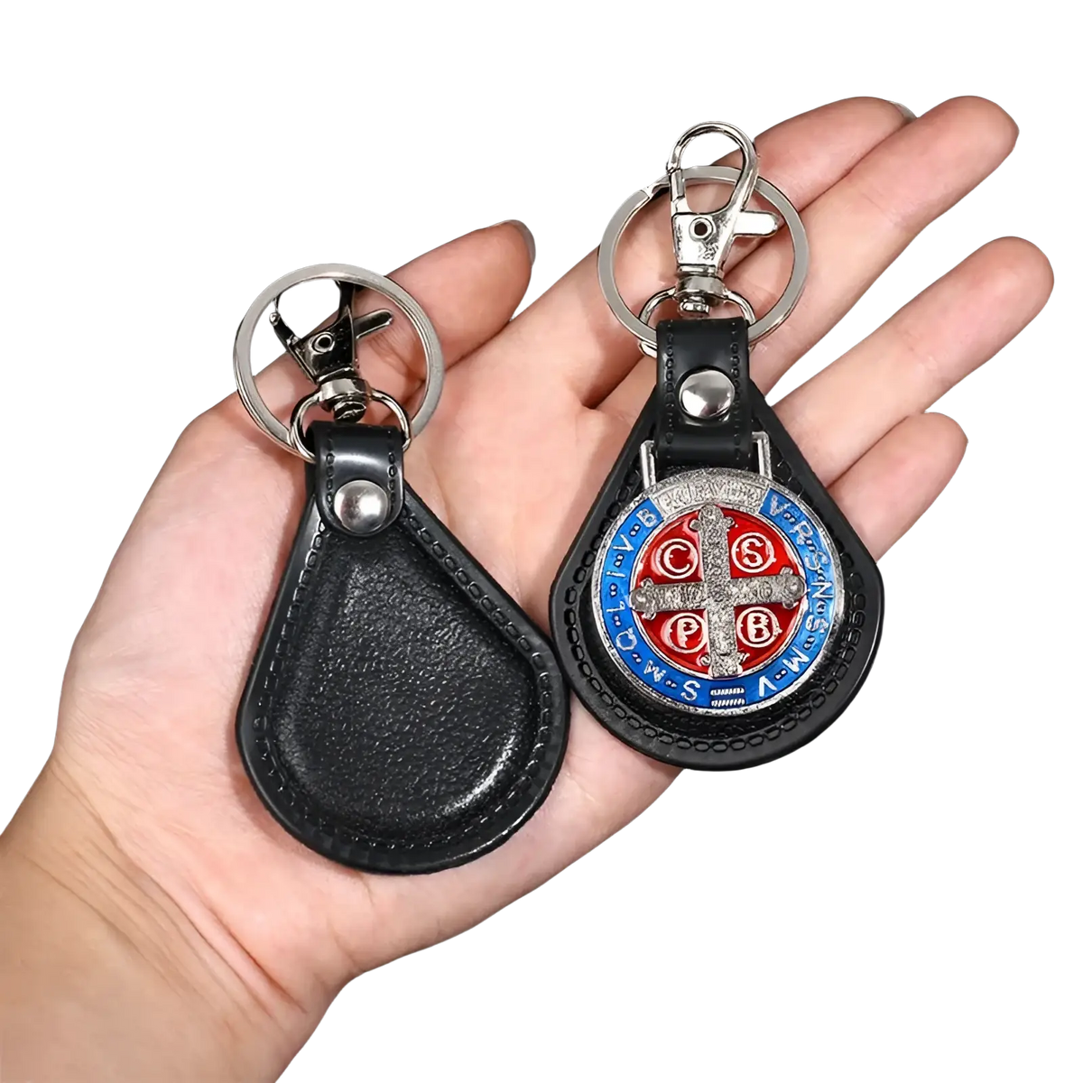 Black leather Saint Christopher keychain with silver clasp and circular red blue silver emblem in antique bronze finish