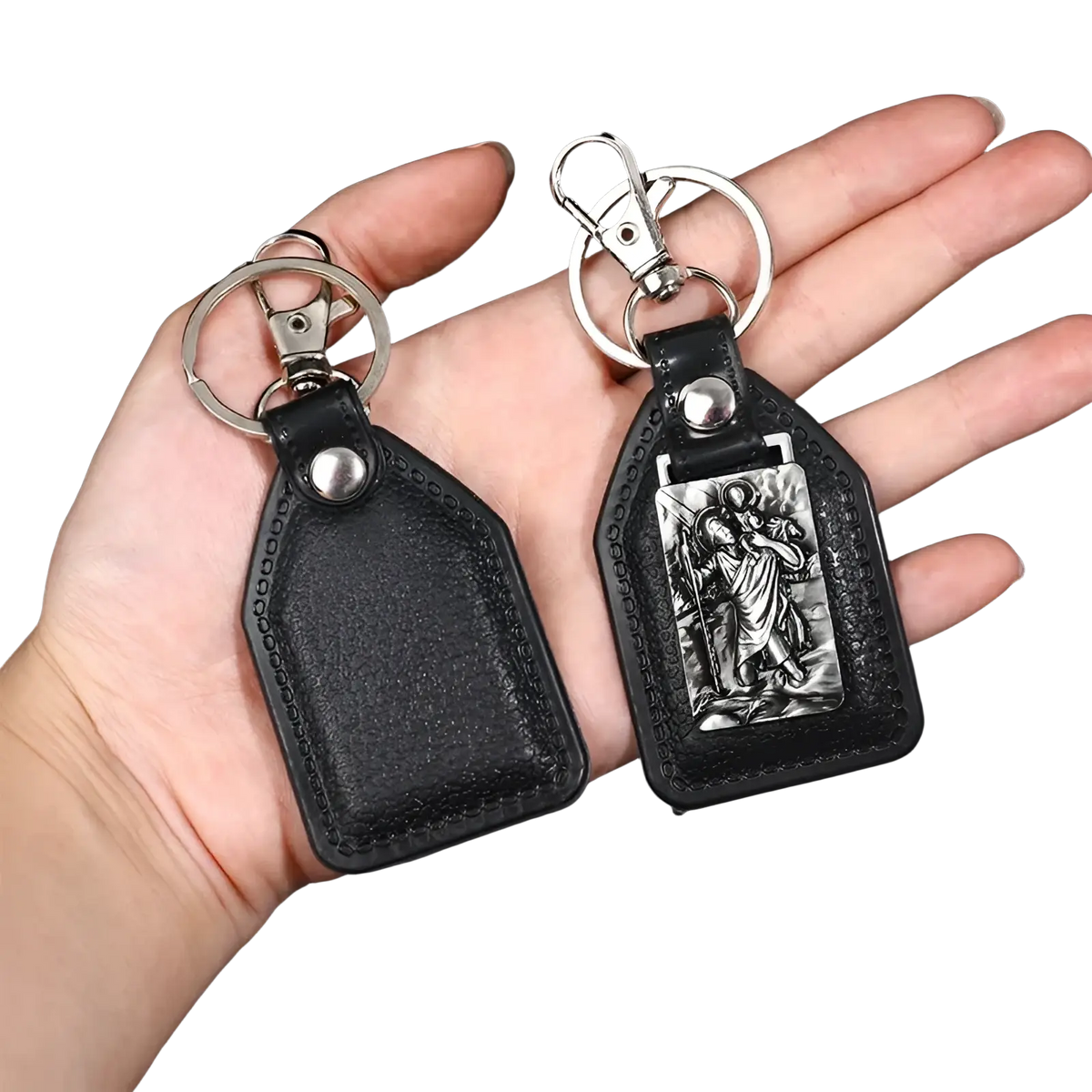 Black leather saint christopher keychain with silver metal clasp and embossed religious figure design antique bronze finish