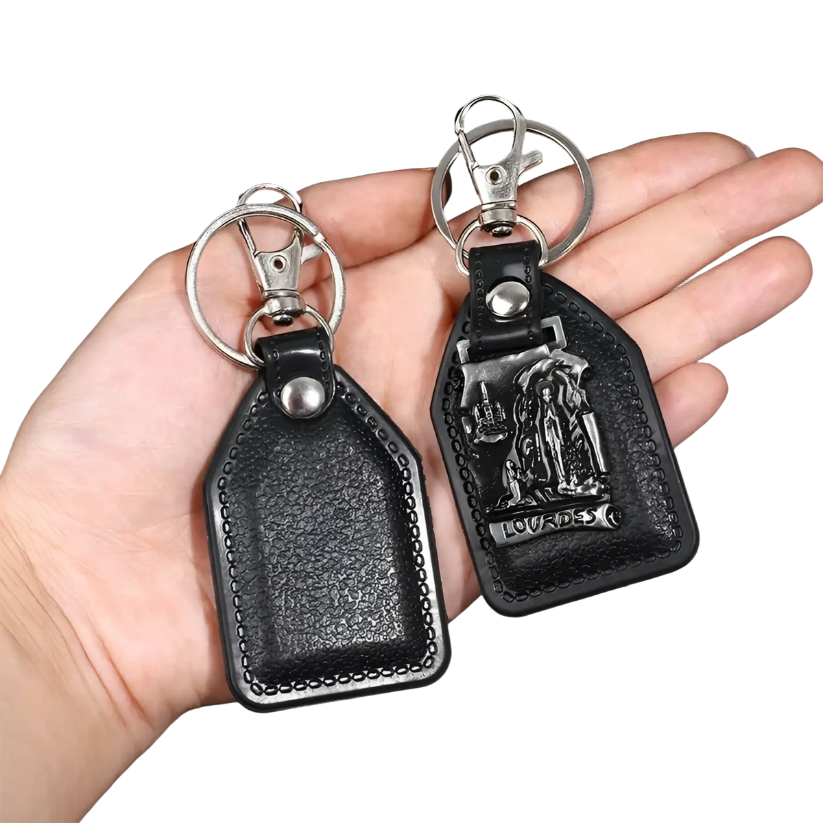 Black leather saint christopher keychains with silver-toned clasps and embossed decorative designs antique bronze finish