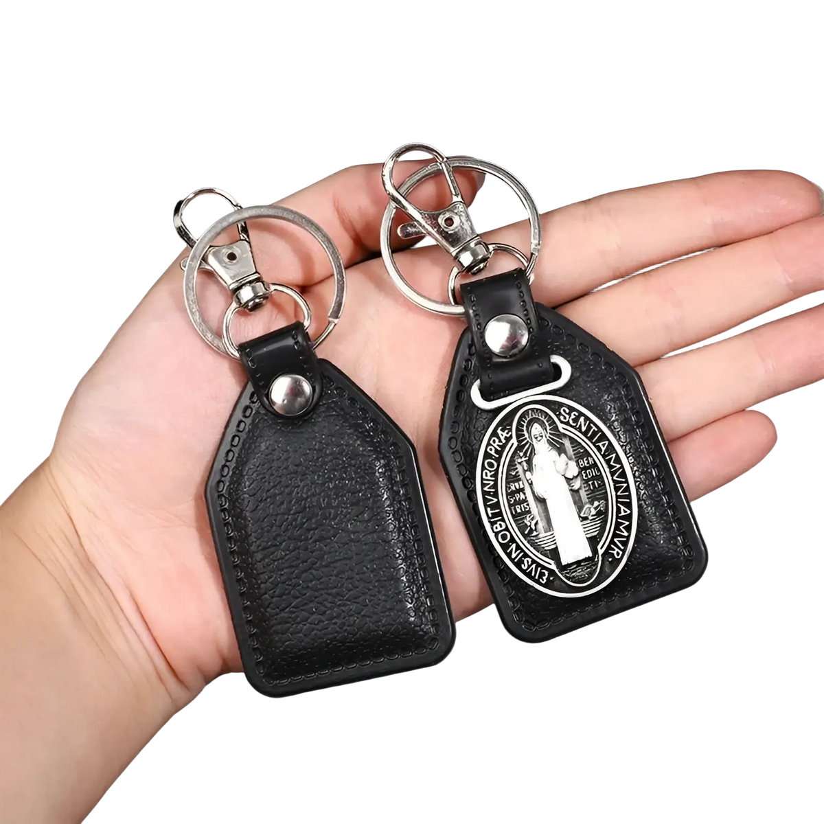 Black leather saint christopher keychain with silver clasp and embossed religious medallion in antique bronze finish