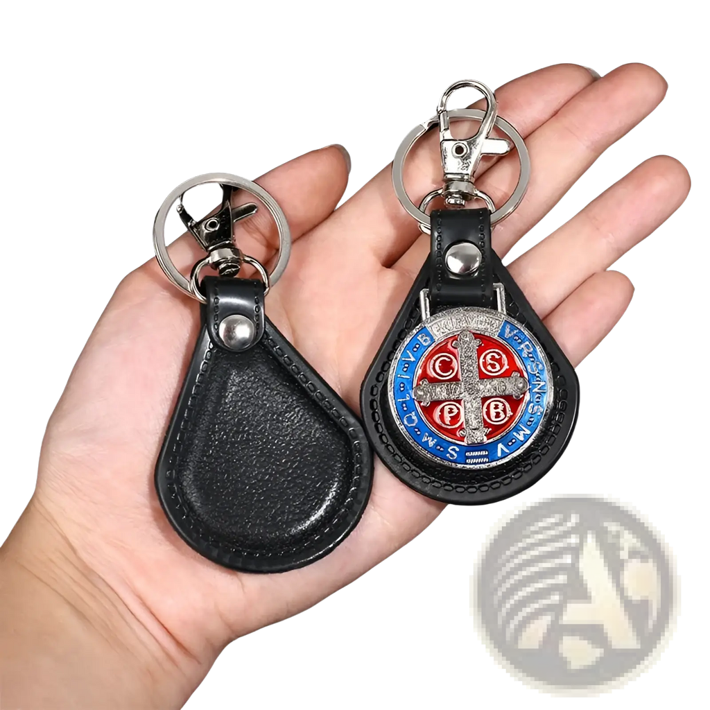Black leather Saint Christopher keychain with silver clasp and circular red blue silver emblem in antique bronze style