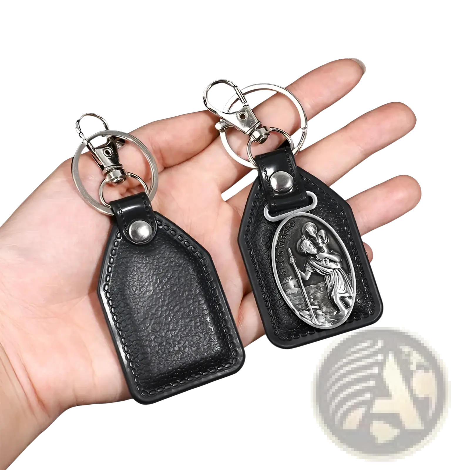 Saint Christopher leather keychain in black with silver-toned clasp and oval bronze medallion depicting saint christopher