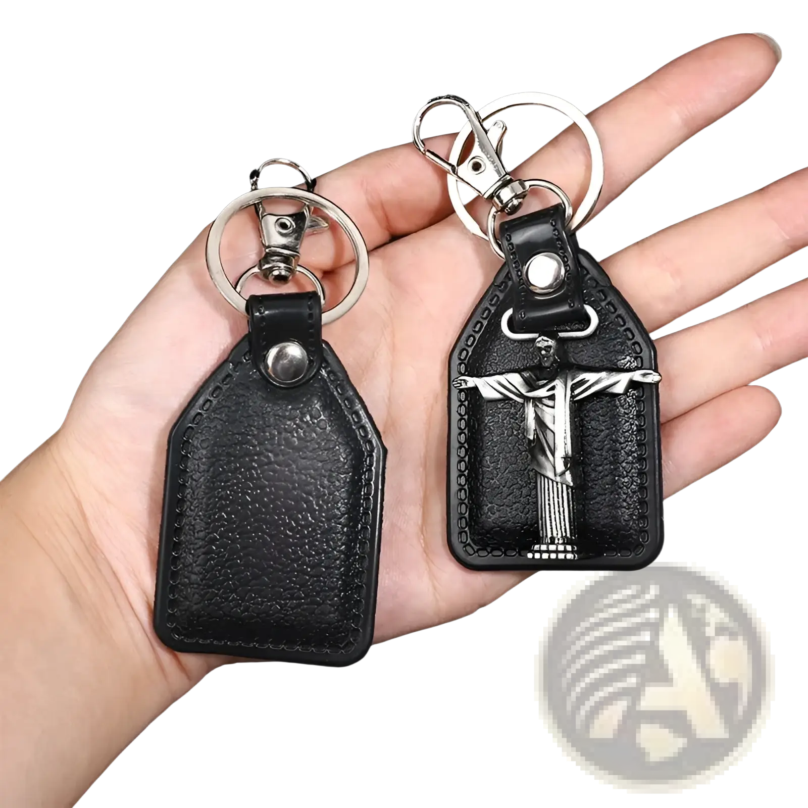 Black leather saint christopher keychain with silver toned metal jesus christ pendant and antique bronze details