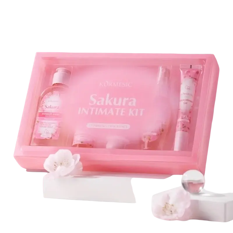 Pink translucent plastic box containing sakura women intimate care 5-piece kit by kormesic for feminine hygiene
