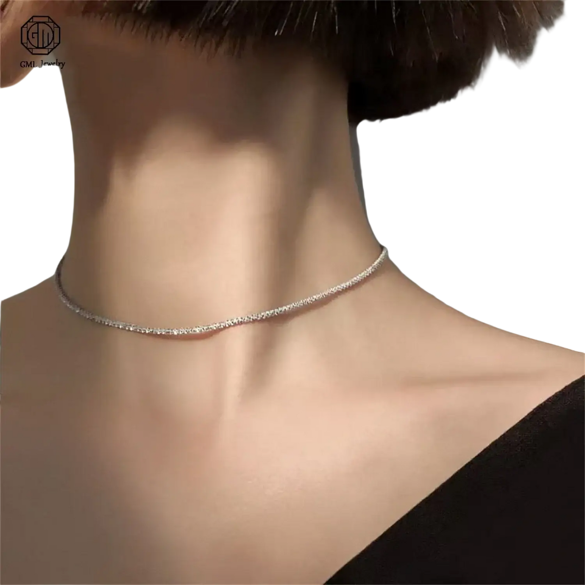 A delicate silver choker necklace with tiny sparkling stones paired with a sand gold adjustable matte wide band unisex ring fade resistant