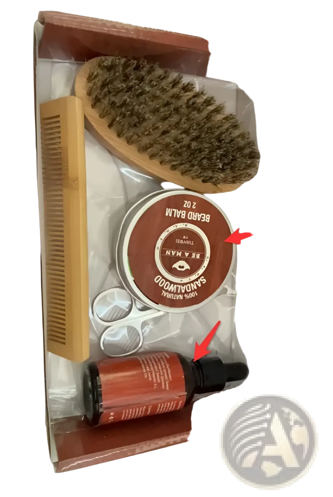 Beard balm in a round tin with a brown label and silver lid featuring sandalwood in a beard care kit with oil and tools
