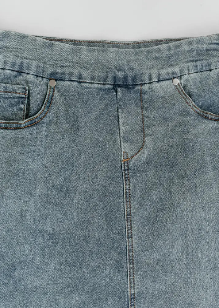 Sandra classic light wash straight denim midi skirt with relaxed fit, two front pockets, and visible stitching details