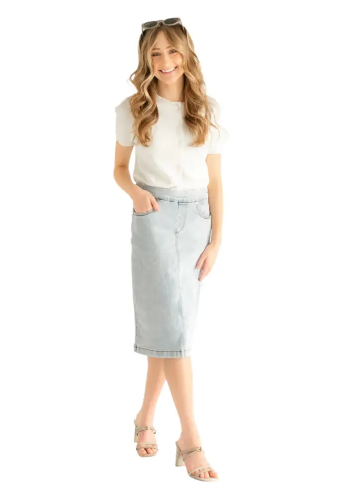 Sandra light wash denim stretch midi skirt with classic straight-leg cut and front pockets in light-wash denim