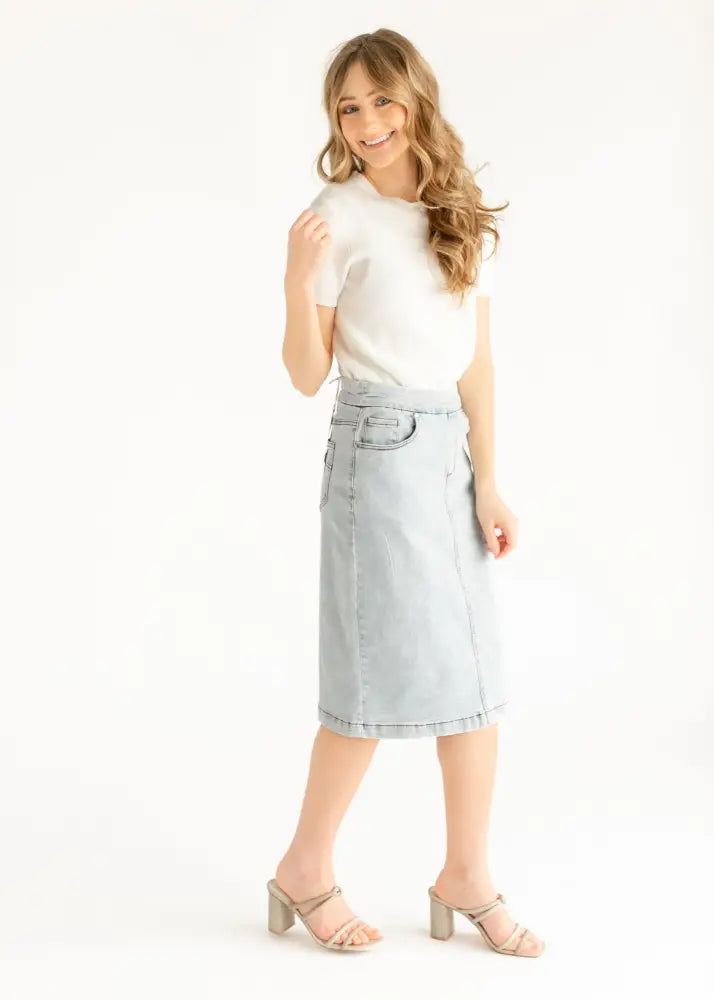 Sandra light wash denim stretch midi skirt in light blue with classic front pocket and clean hemline