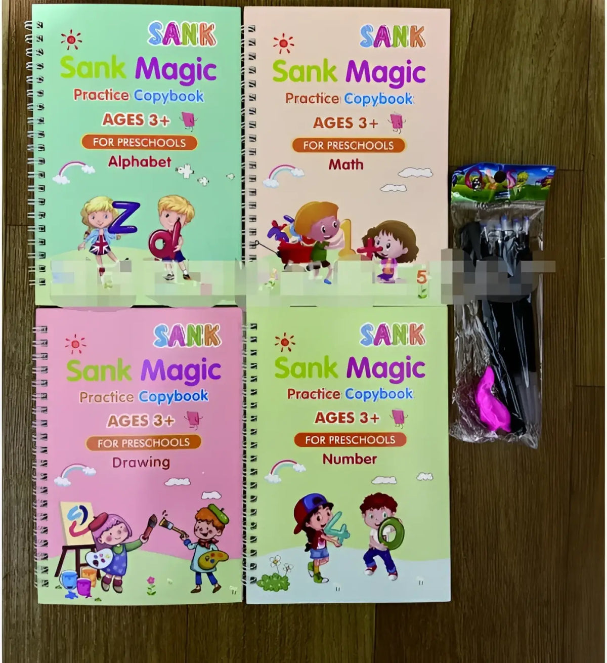 Four colorful spiral-bound sank magic practice copybook workbooks for preschoolers featuring alphabet math drawing and number