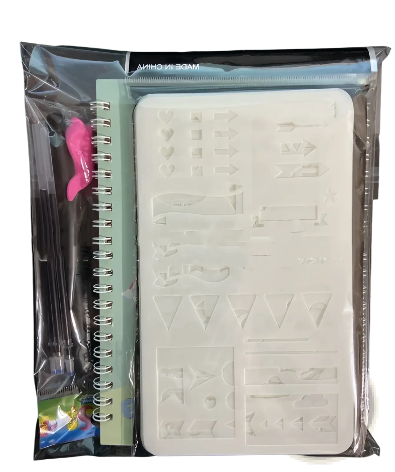 White plastic stenciling template with embossed geometric and arrow patterns for sank magic practice copybook set