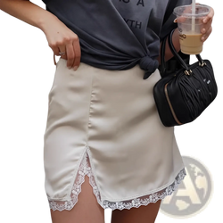 Cream-colored satin a-line mini skirt with delicate white lace trim along the hem for elegant wear