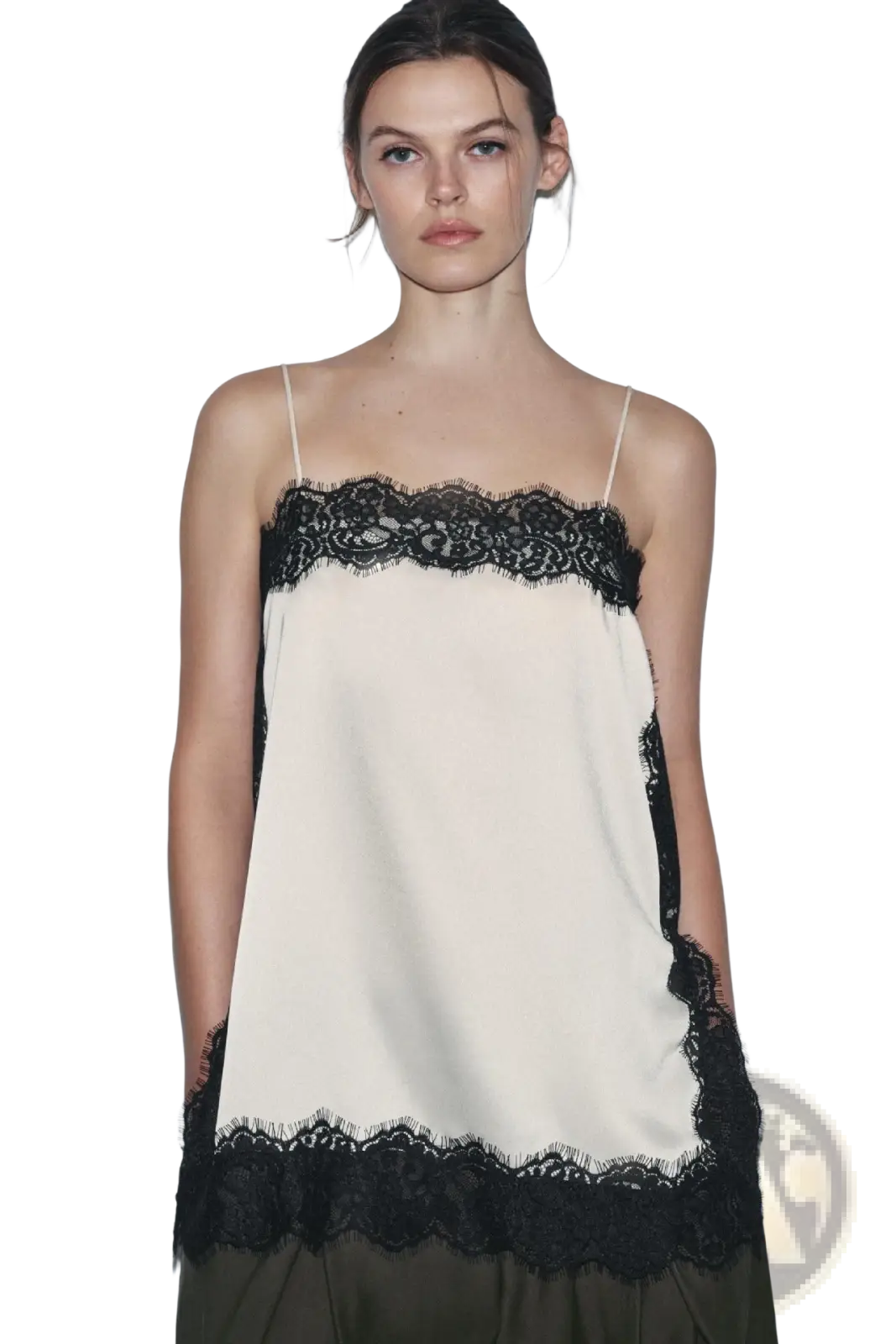 Cream-colored satin camisole top with black lace trim along the neckline and hem for elegant wear