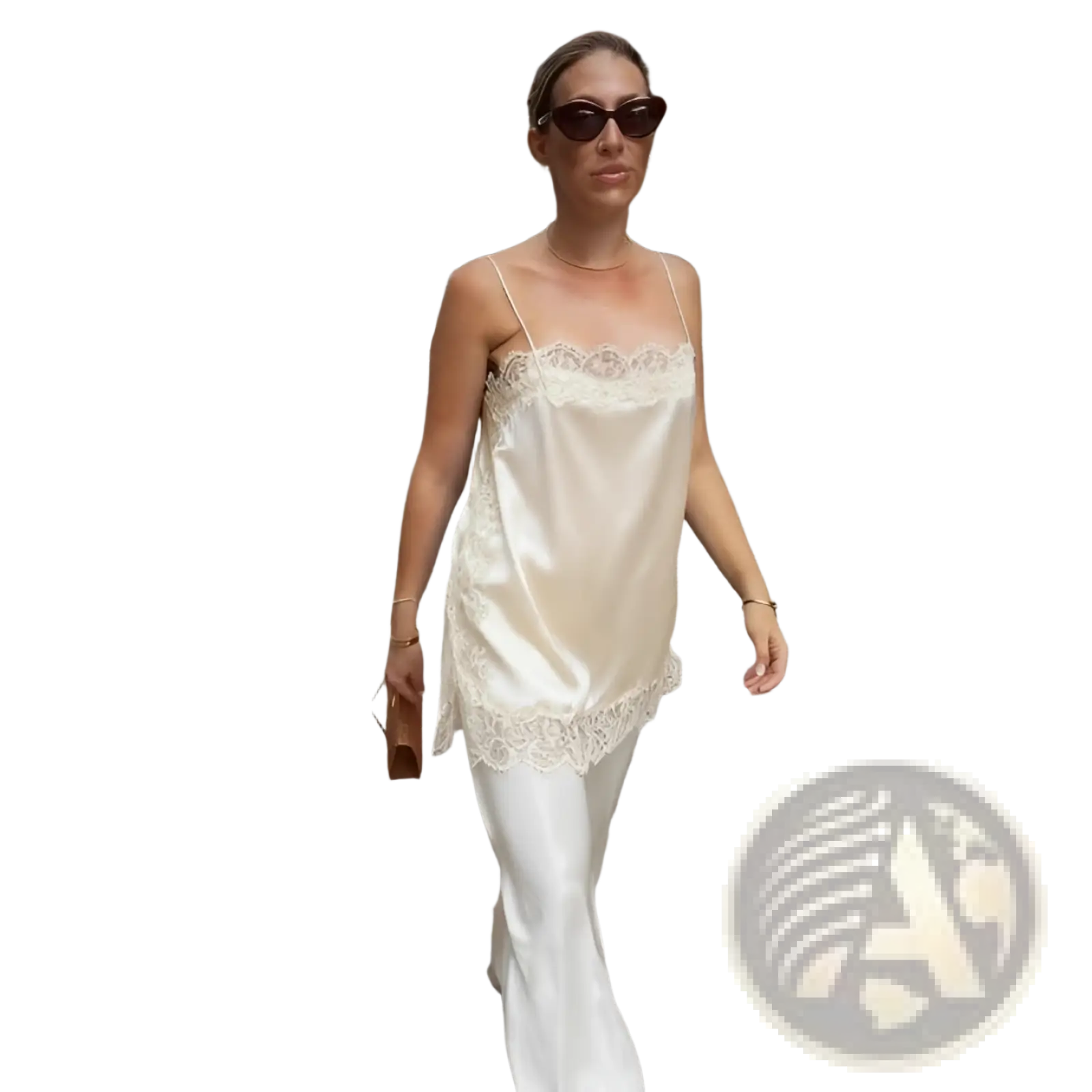 Cream satin camisole top with delicate lace trim showcasing luxurious fabric and elegant design