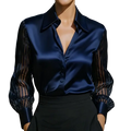 A navy blue satin long sleeve blouse with sheer striped sleeves and classic collar for spring autumn wear