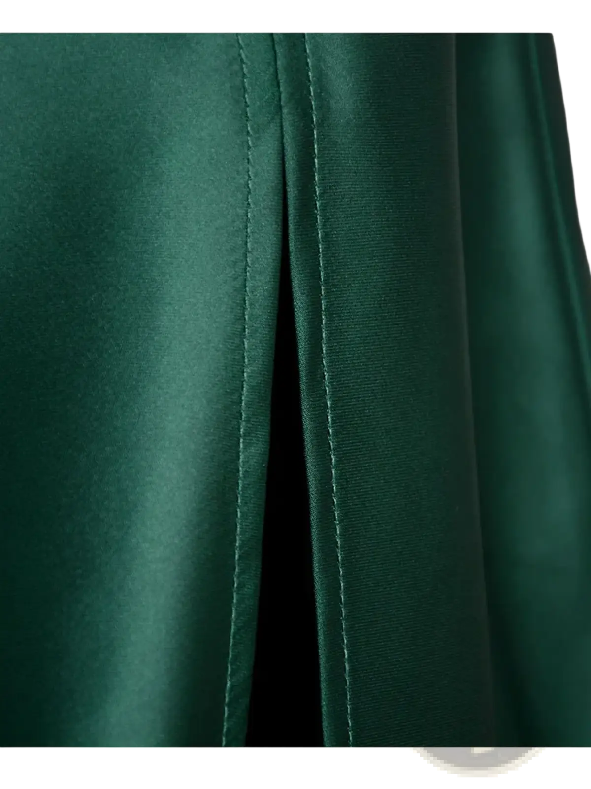 Deep emerald green satin midi skirt high waist slit with smooth glossy texture and precise stitching along the seam