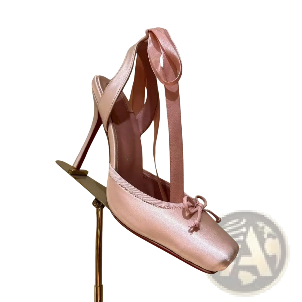 A blush pink satin high-heeled pump with square toe ankle strap bow and leather sole satin ribbon high heel ballet flats