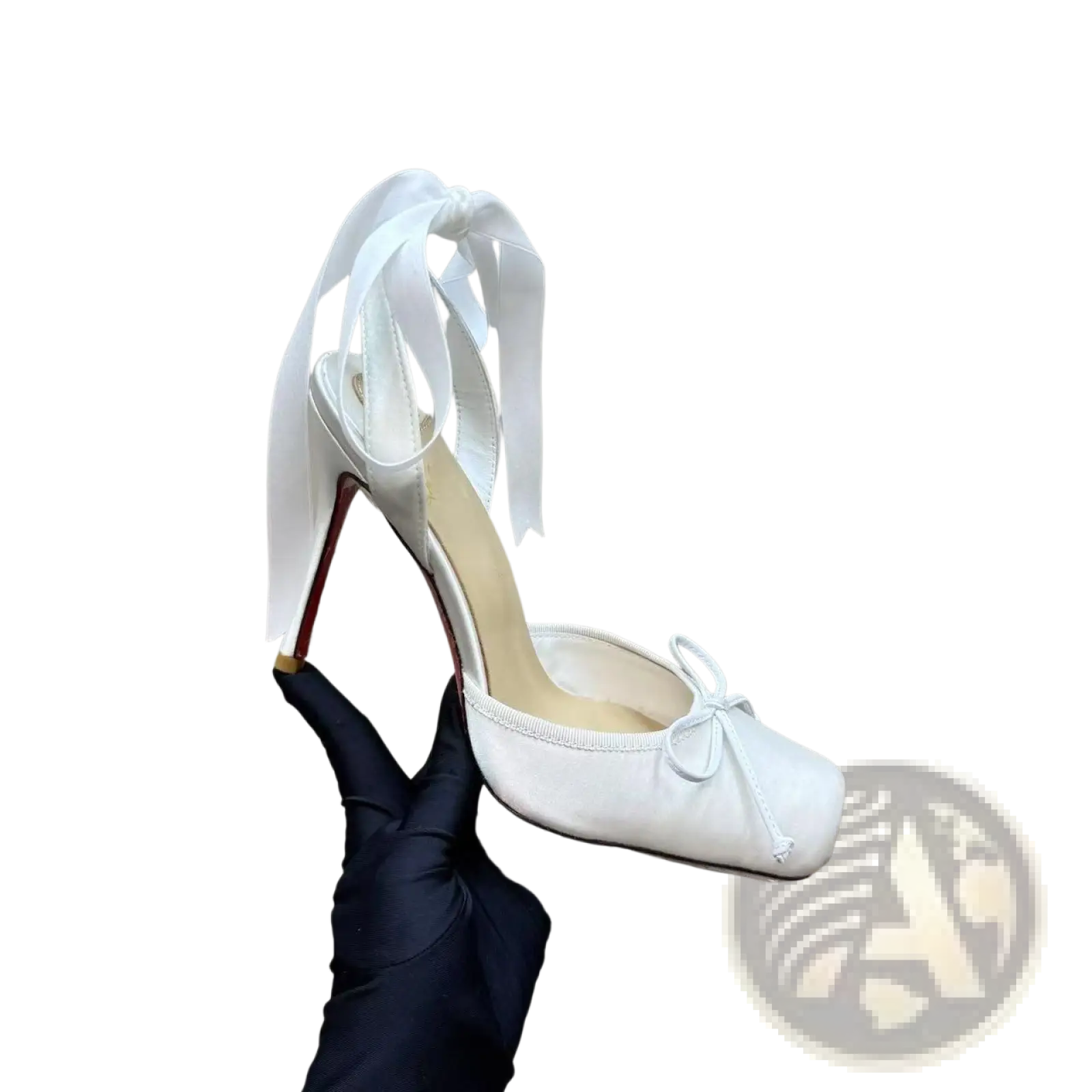 White satin high-heeled pump with leather sole featuring a bow at the ankle and a small bow on the toe