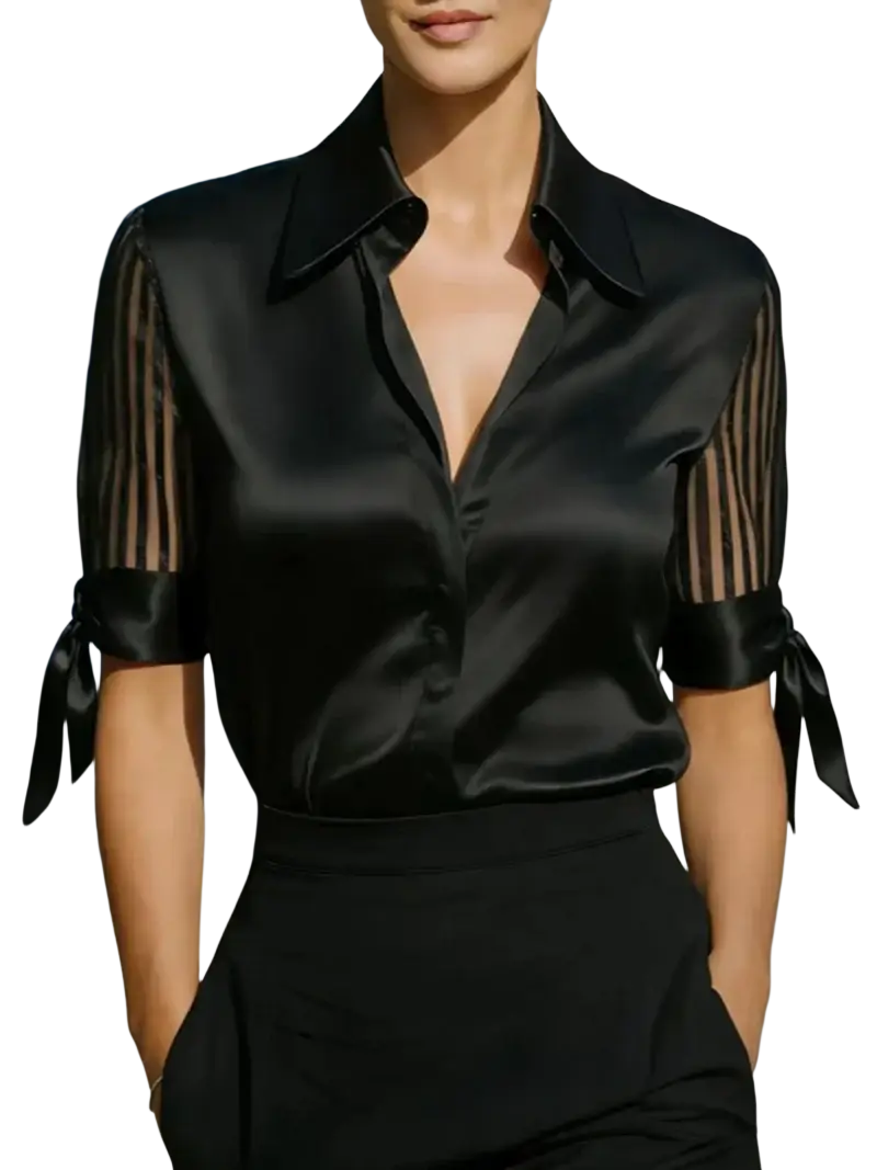 Black satin blouse with sheer striped sleeves and tied cuffs featuring a red sheer sleeve detail