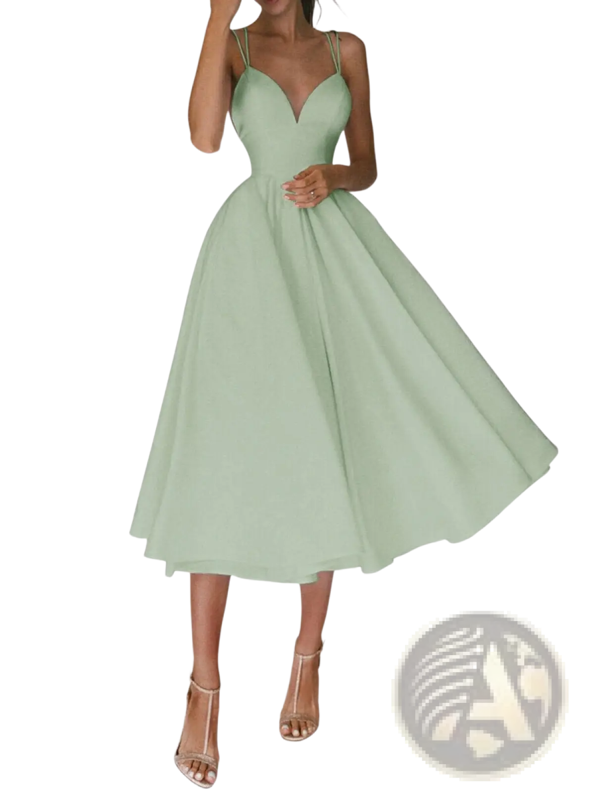 A flowing mint green satin v neck midi dress with thin spaghetti straps and a fitted bodice
