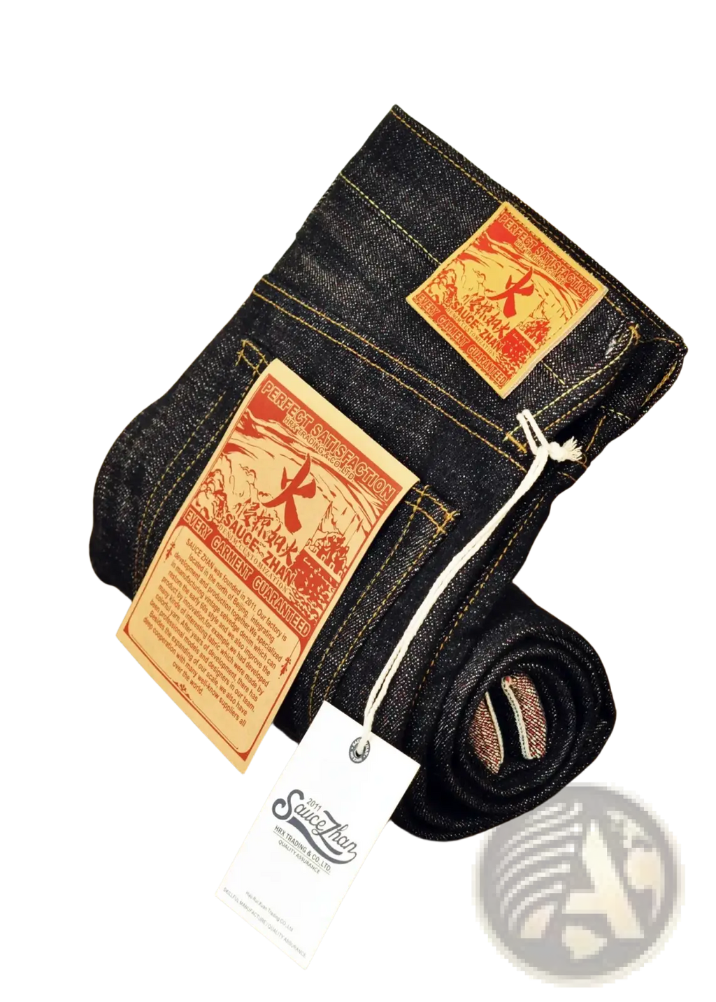 Dark indigo saucezhan fire selvedge tapered raw denim jeans with orange and red embroidered patches and rugged design