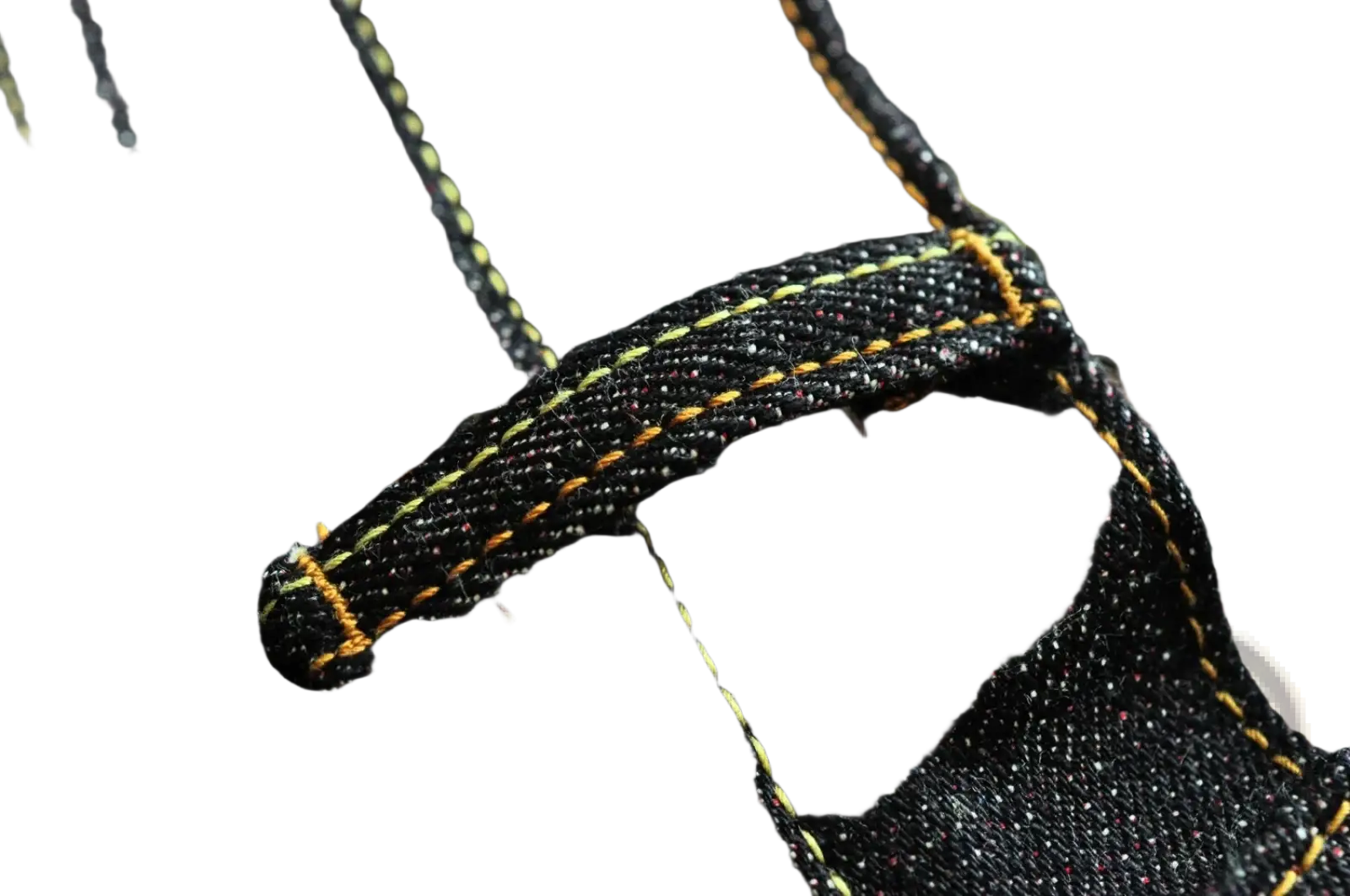 Saucezhan fire selvedge tapered raw denim jeans in dark indigo with yellow stitching and subtle speckled texture