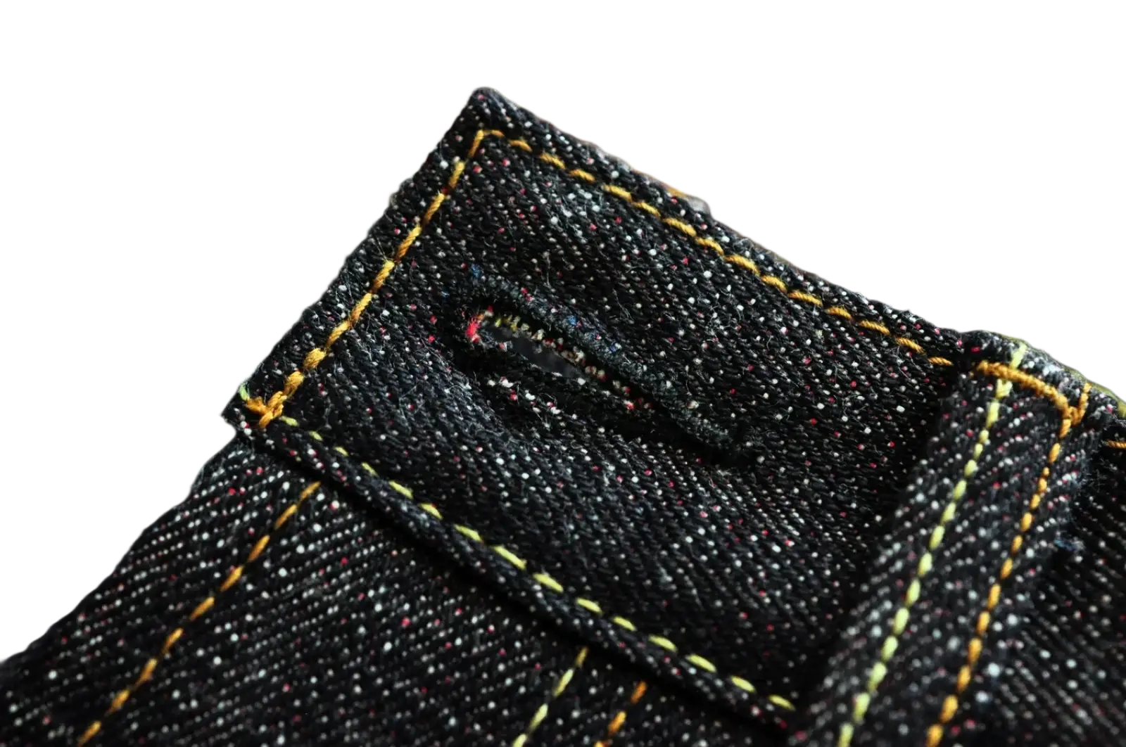 Sauzezhan fire selvedge tapered raw denim jeans in dark indigo with yellow stitching and subtle speckled texture