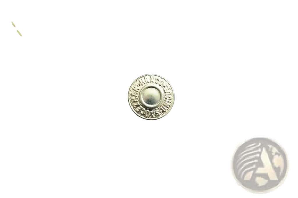 Silver circular Levi’s button embossed on dark denim with yellow stitching in Saucezhan Fire Selvedge Tapered Raw Denim Jeans