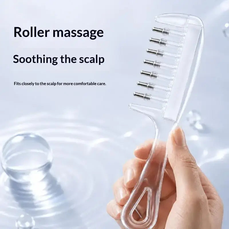 Clear plastic scalp massage applicator brush with metallic rollers for essential oil soothing scalp massage