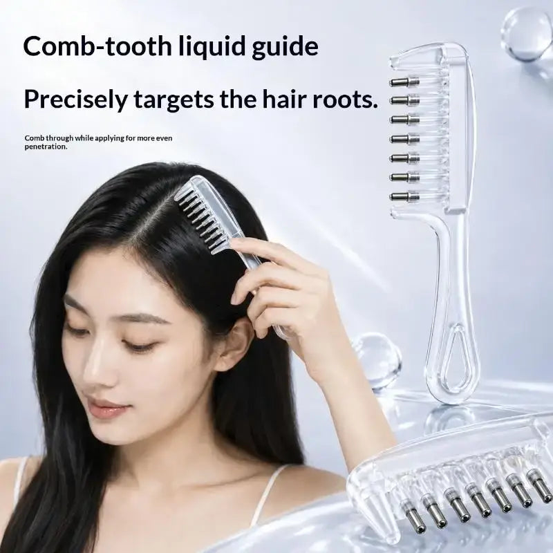 Clear plastic scalp massage applicator brush with metallic tips for precise essential oil hair root application