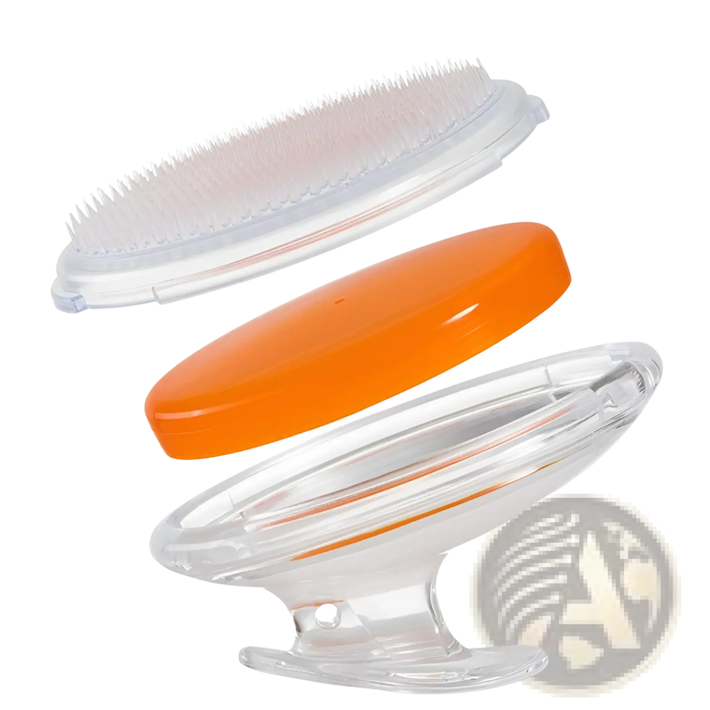 Transparent plastic scalp massage brush with orange lid and white bristles designed for exfoliating hair care