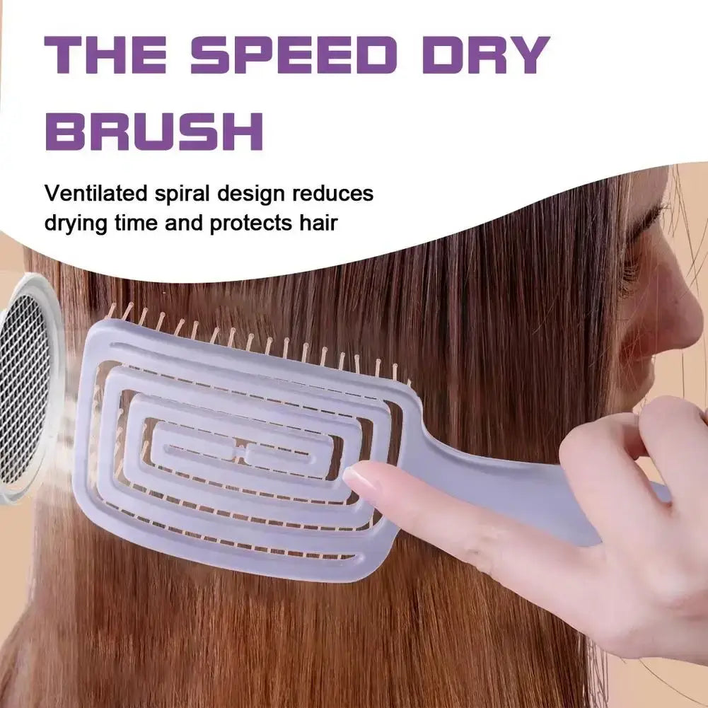 Light gray plastic scalp massage styling brush with ventilated spiral design and multiple rows of fine bristles