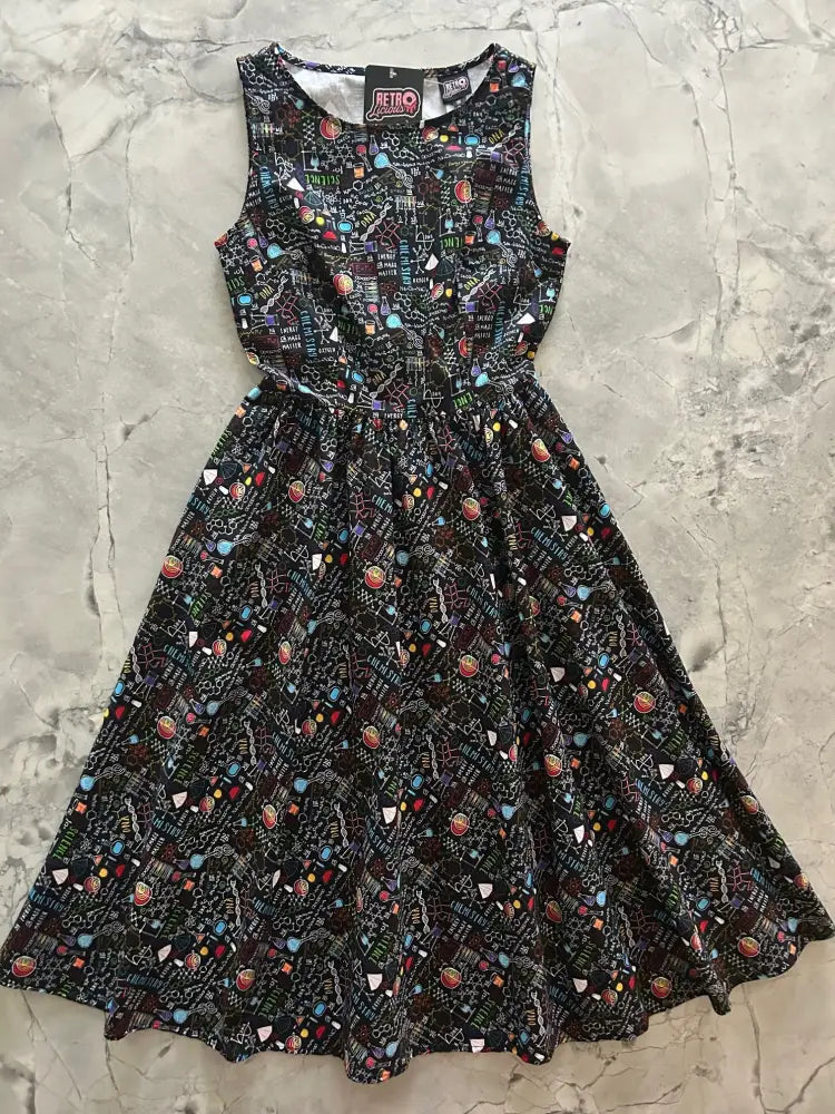 Black sleeveless 1950s cotton midi dress with colorful chalkboard science print and pockets