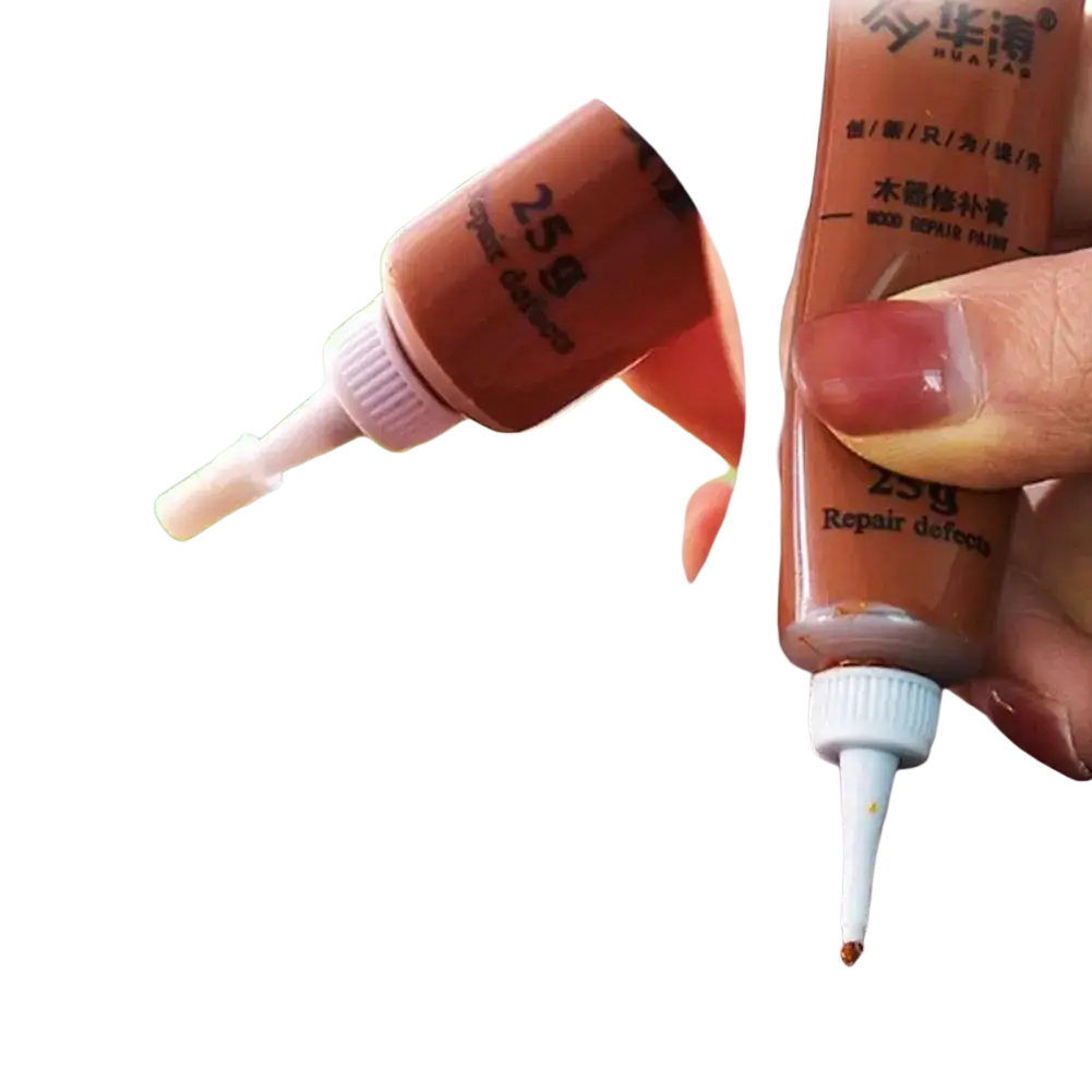 A 25g huaxia brown wood repair paste tube with white nozzle for touch-up paint and complementary paint use