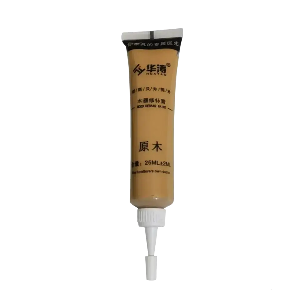 A beige tube of huatiao wood repair paste with white nozzle labeled in chinese for scratch repair and touch-up paint