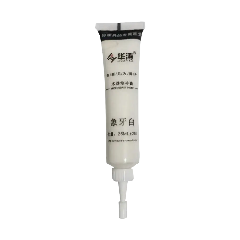 White tube of Huatao brand elephant ivory wood repair paste and touch-up paint with nozzle tip for complementary paint use
