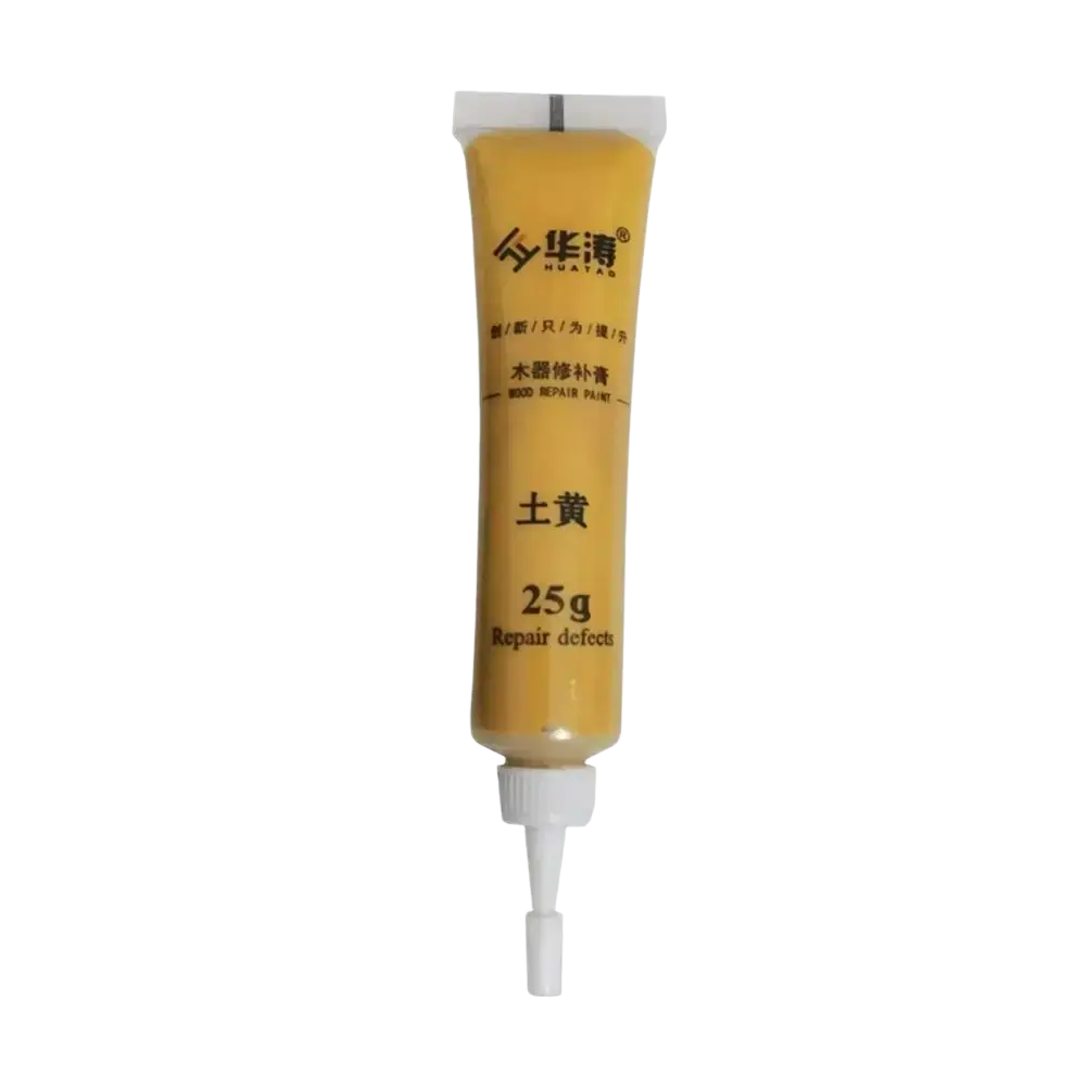 A yellow tube of huatai scratch repair paste and touch-up paint 25g with white cap and nozzle for wood repair