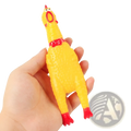 Yellow rubber chicken stress reliever with red beak feet and collar squeaky toy for stress relief