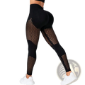 Black high-waisted Scrunch booty lifting gym leggings with mesh panel design showcasing the back side