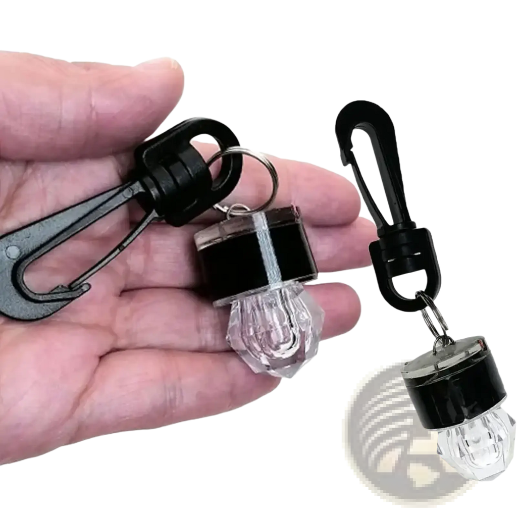 Black and clear solar-powered scuba diving safety led beacon keychain light with faceted crystal bulb