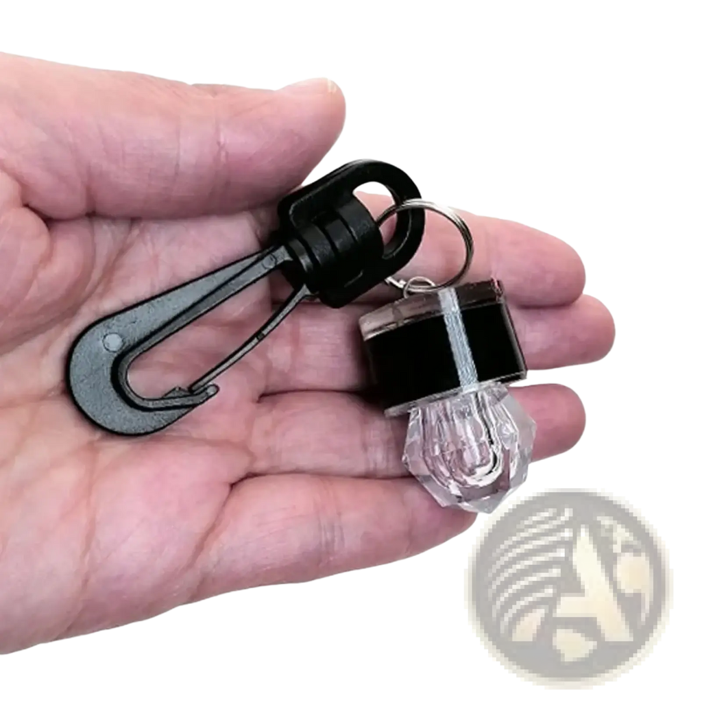 Black and clear solar-powered scuba diving safety led beacon keychain light with faceted crystal bulb