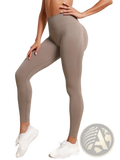 Seamless high waist butt lifting leggings in tan with ribbed texture and seamless design shown from the back side
